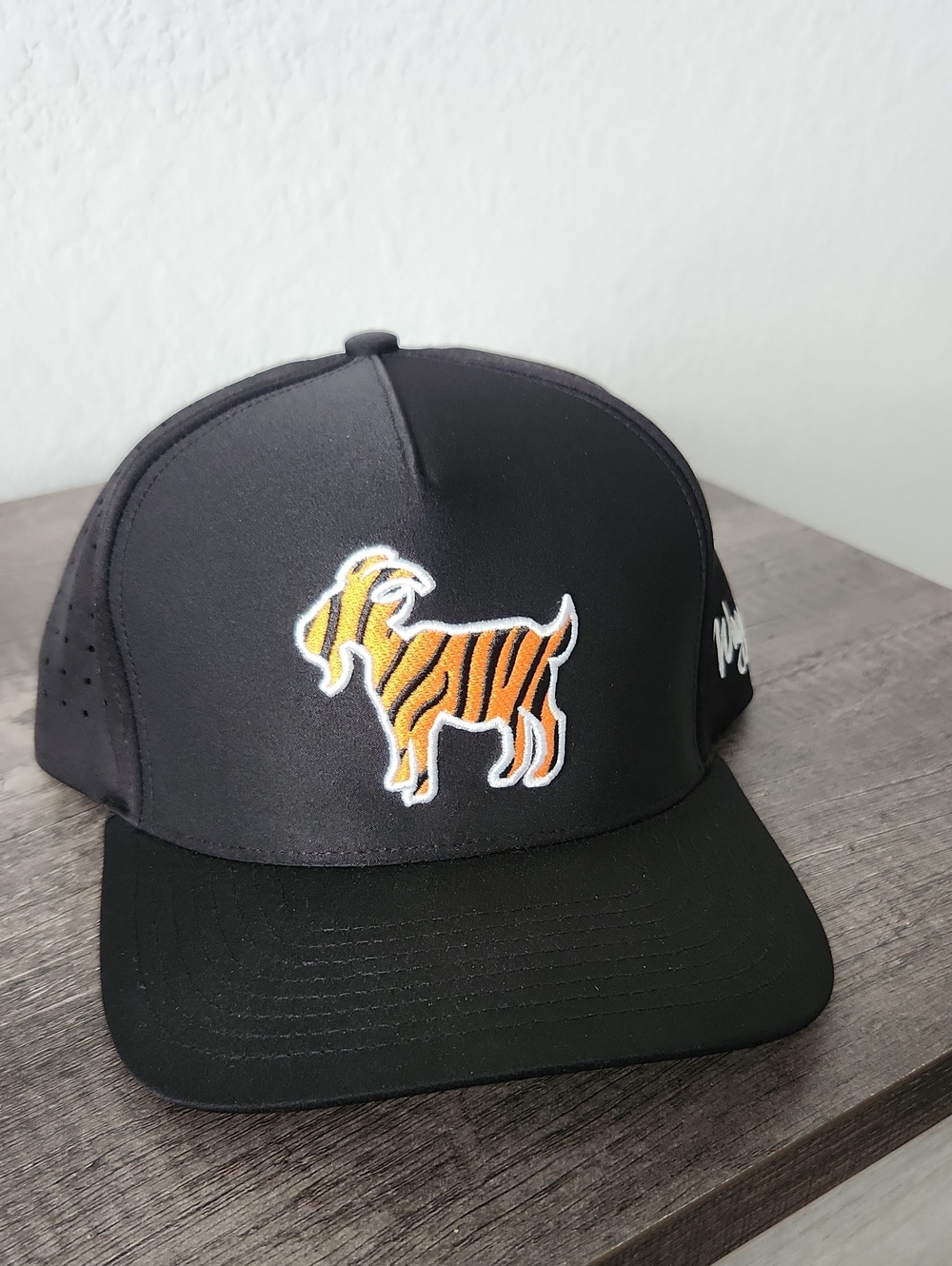 Black Trucker Hat with Orange Tiger-Goat Patch